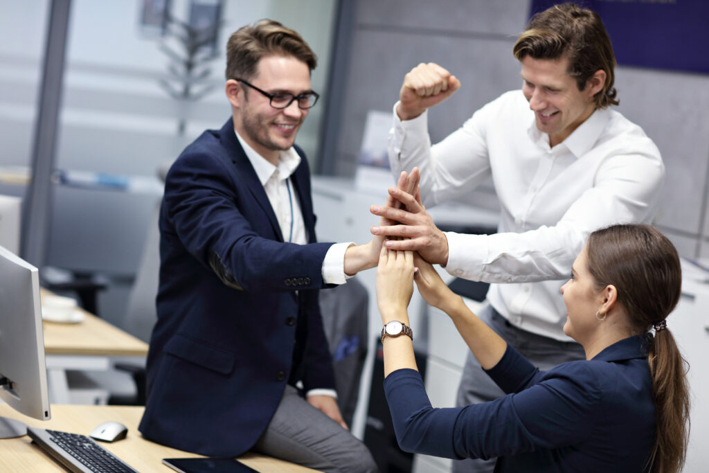 Motivated sales team working together